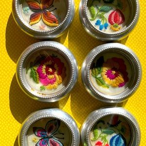 6 Vintage Metal Coasters w Embroidered Inserts.